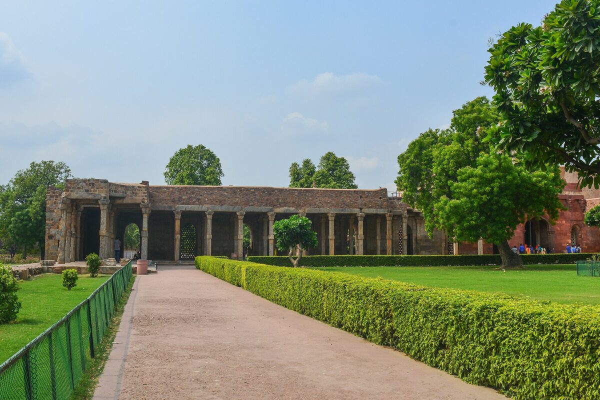 Qutub Minar rising above the Qutb complex in Mehrauli, Delhi